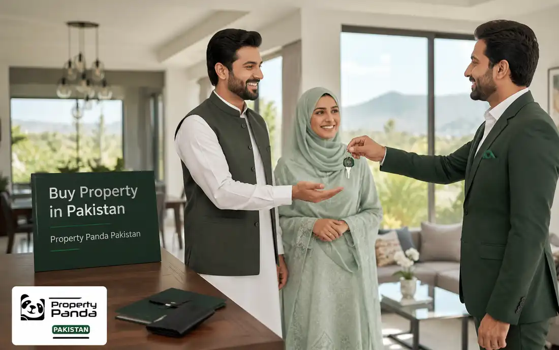 Pakistan homebuyer receiving property keys
